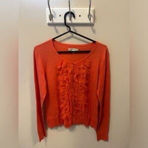 Beth Bowley orange sweater